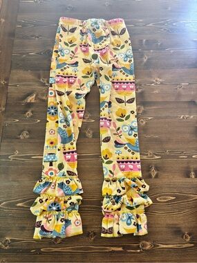 Jelly The Pug Yellow Floral & Bird Ruffle-Hem Leggings